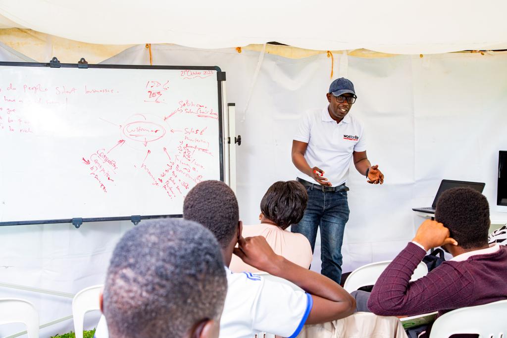 Teaching business strategy at whiteboard session