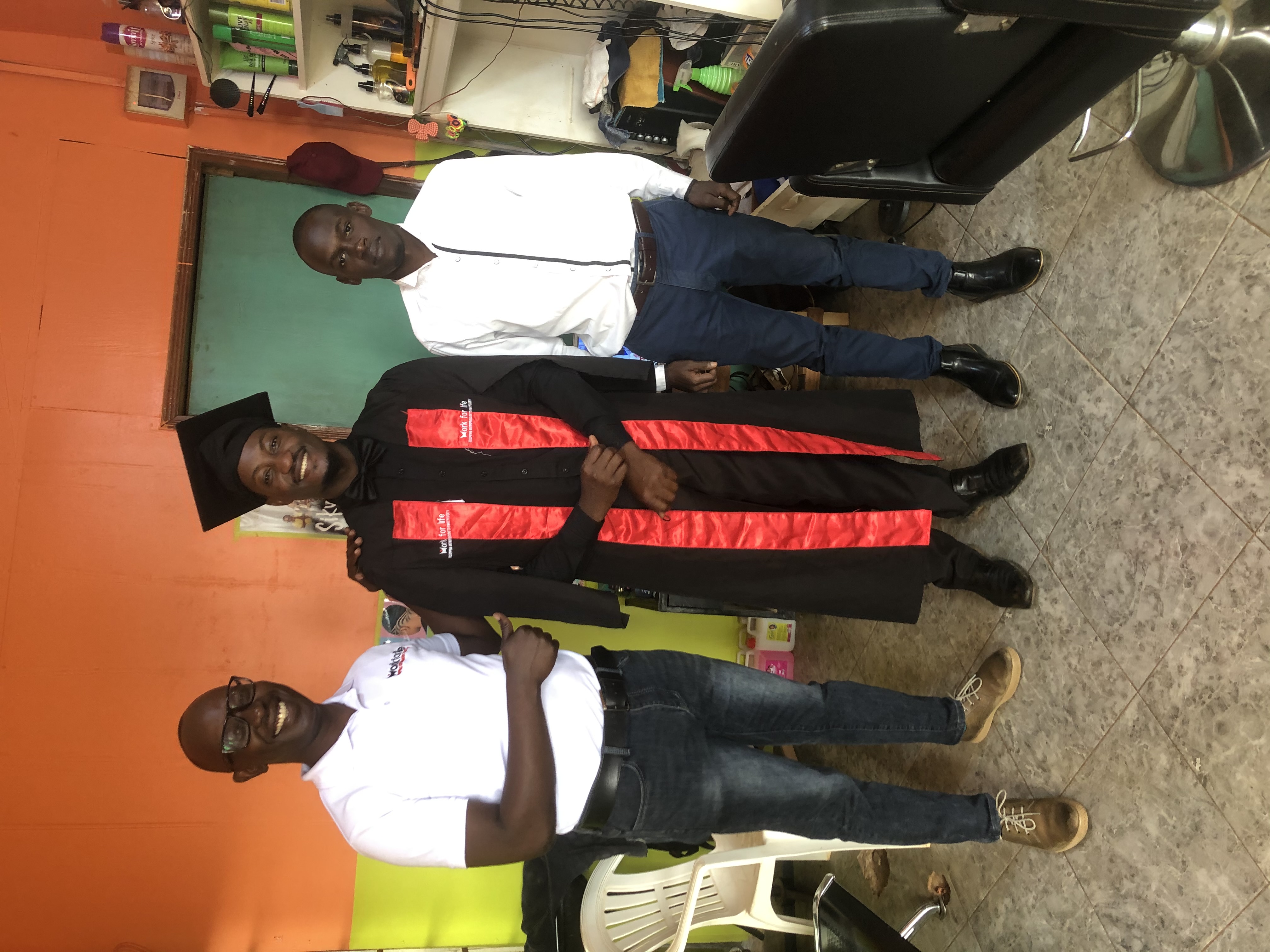 Graduate with certificate at Work for Life ceremony